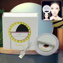 Selfie ring light with adjustable brightness levels.