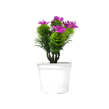 Plastic pot with artificial flowers.