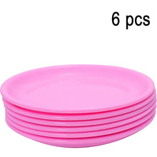 Stack of round mini soup plates displaying their compact size.