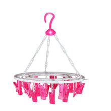 Sturdy multicolour round drying hanger with 24 clips.