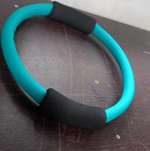 Yoga and pilates ring for home fitness, circle ring for exercise.