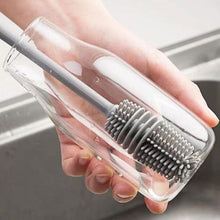 Multi-purpose cleaning brush for kitchen use.